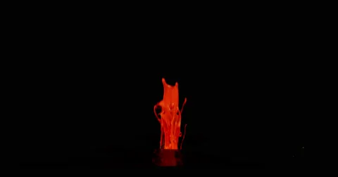 Red paint in motion in 4K Stock Footage 59919131