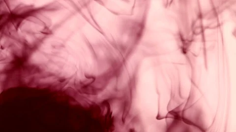 Red paint poured in water Stock Footage 73606369