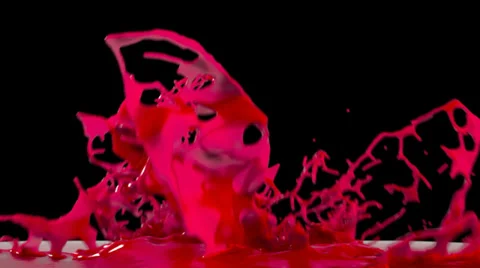 Red paint splashing, isolated on black backgorund Stock Footage 38907868