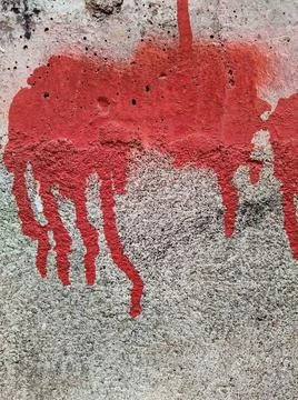 Red paint on the wall flows down Stock Photos