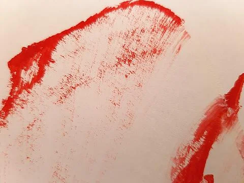 Red paint on white background Stock Photos