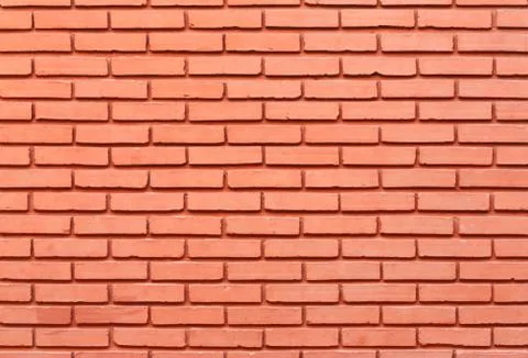 Red painted brick wall Stock Photos