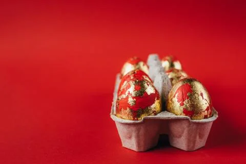 Red painted Easter eggs on red background Foto stock