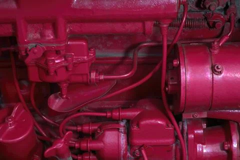 Red painted engine old machine parts industrial background antique technology Stock-Fotos