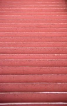 Red Painted wall in order background Stock-Fotos