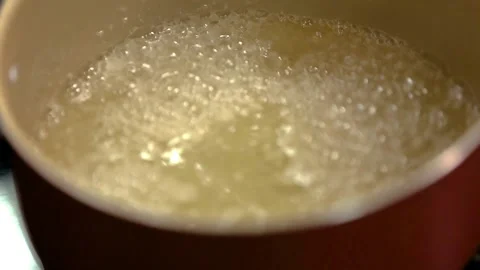 Red Pan With Bubbling Water Video stock 114873128