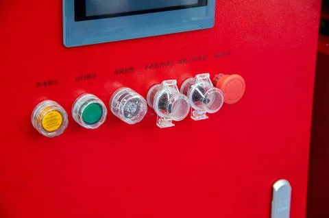 A red panel with buttons and a screen that says "F" on it Stock Photos