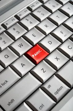 Red panic button on computer keyboard Stock Photos