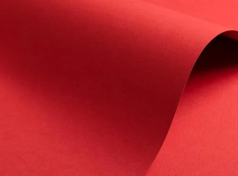 Red paper background with a matte texture. Bold crimson and maroon hues cre.. 스톡 사진