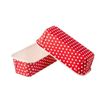 Red paper baking forms for cakes with dotted pattern Stock Photos