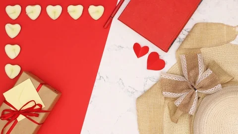 Red paper comes out from envelope with romantic decoration - Stop motion Stock-Footage 121776734
