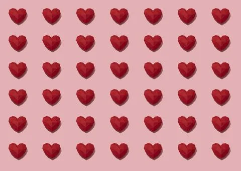 Red paper hearts pattern on pink background Stock Photos