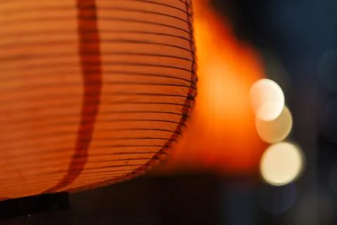 Red paper lanterns glowing at night on street Stock Photos