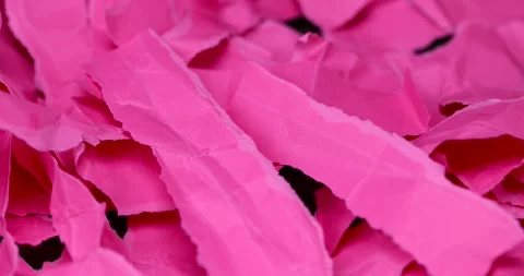 Red paper torn into strips in close-up, red paper torn into pieces Stock Footage 288686495