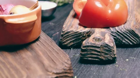 Red paprika on rustic wood Stock Footage