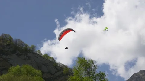 Red paraglider tandem Stock Footage 63371193