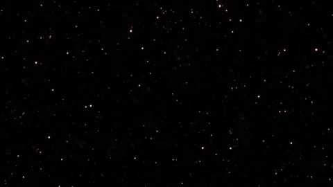 Red particles and dust floating in the air on Black Background Stock Footage 319788782