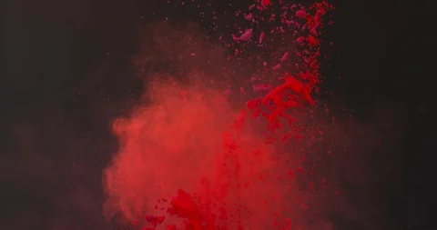 Red particles burst on black background Stock Footage 98212697