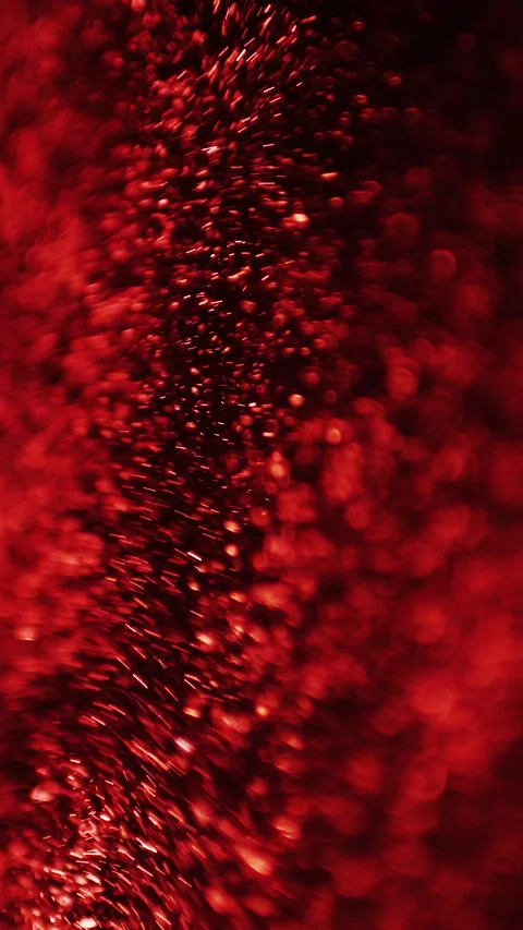 Red particles flying on black background. Animation background. Vertical video. Stock Footage 273723354