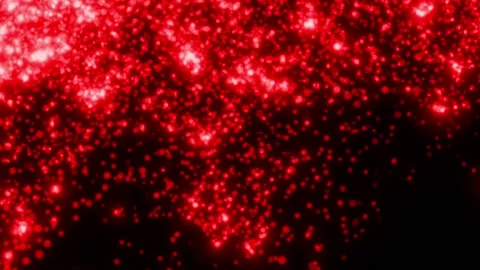 RED particles glowing on the black background. Black background with light pa Stock Footage 218579464