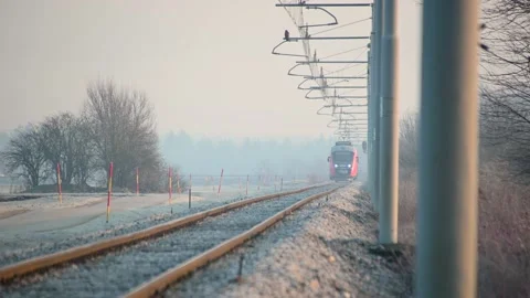 Red passenger train coming towards camera Stock-Footage 149891869