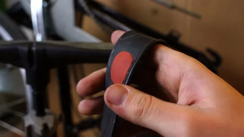 Red patch on a bicycle tube Stock Footage 238861220