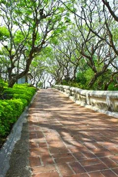 Red pathway in the park Stock Photos