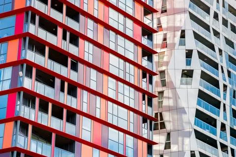 Red patterns of the Calypso building create geometric patterns in Rotterdam Stock Photos