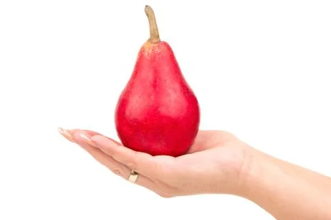 Red pear in hand Stock Photos
