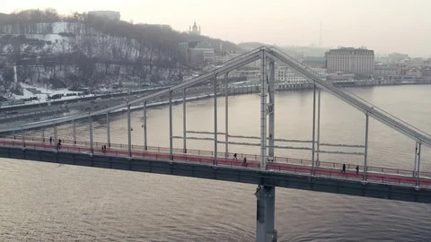 Red pedestrian bridge across Dnіpro Stock Footage 123731268