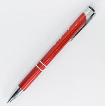 Red pen for the office or back to school Stock Photos