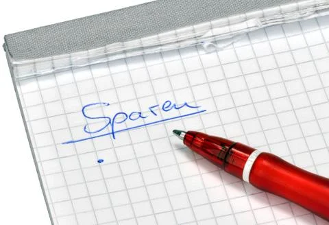 Red pencil for cutbacks Stock Photos
