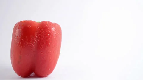 Red Pepper Against White - Crane Down Stock Footage 22648574