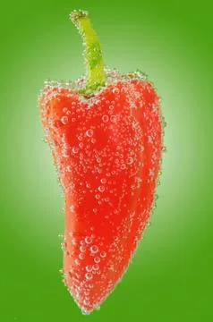 Red  pepper and bubbles Stock Photos