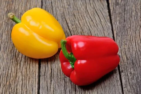 Red pepper and yellow on table Stock Photos