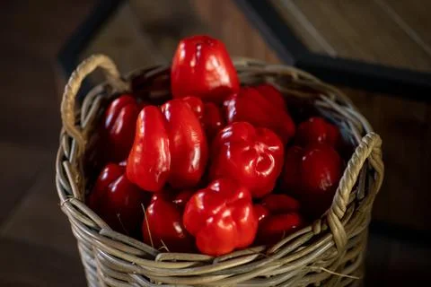 Red pepper in a basket Stock Photos