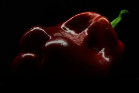 Red pepper on black background 01 Stock Photos