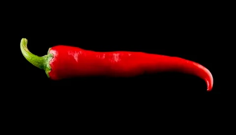 Red pepper on a black background closeup Stock-Fotos