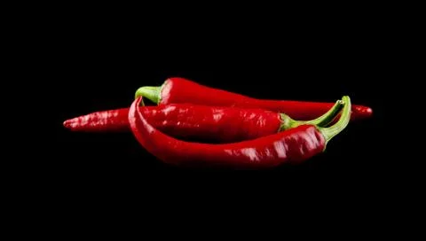 Red pepper on a black background Stock Photos