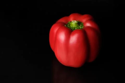 Red  pepper on a black background Stock-Fotos
