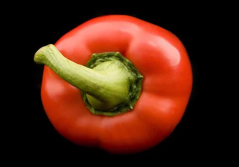 Red Pepper on Black Background. Selective Focus Stock Photos