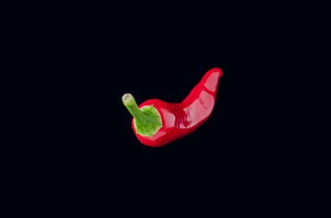 Red, pepper, black, black background Stock Photos