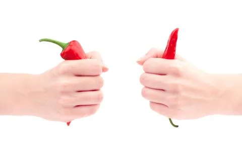Red pepper chilli in the hands Stock Photos