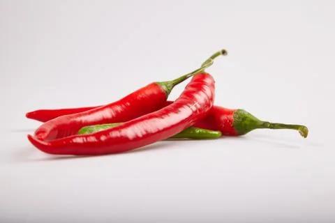 Red pepper chilli on a white background Stock Photos