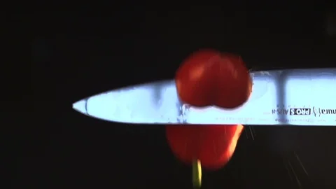 Red pepper is cut in flight Stock Footage 93961570