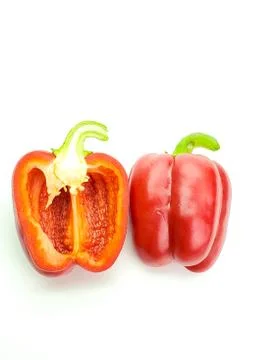 Red pepper cut in half, isolated on a white background Stock Photos