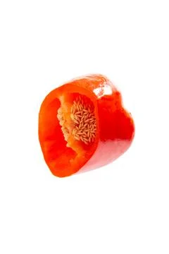 Red pepper cut in half, isolated on white background. Stock Photos