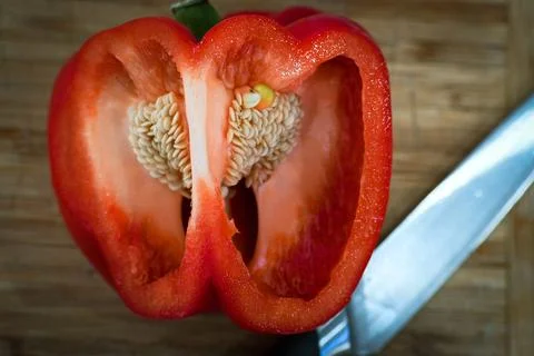 Red pepper cut in half Stock Photos