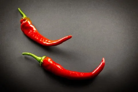 Red pepper on a dark background Stock Photos