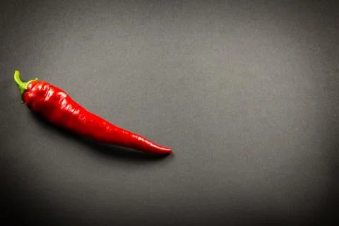 Red pepper on a dark background Stock Photos